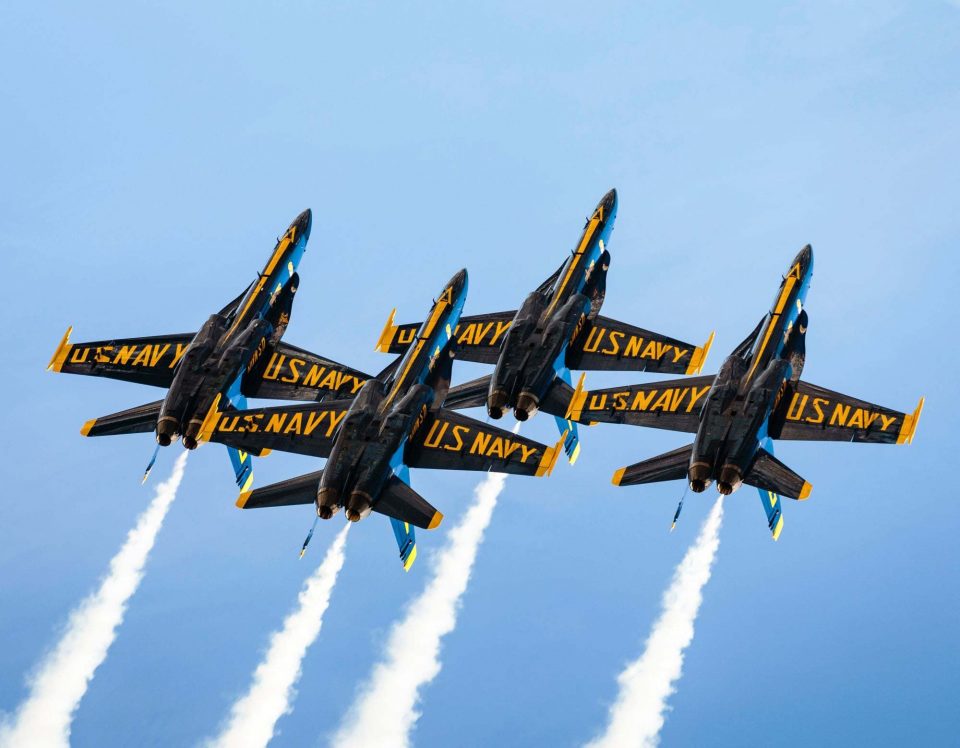 The Blue Angels flying in tight formation