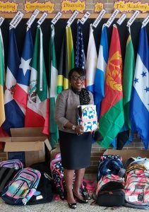 Coleman Group Donates Backpacks and school supplies 